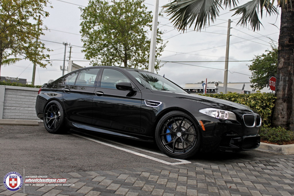 Black bmw with black rims #6